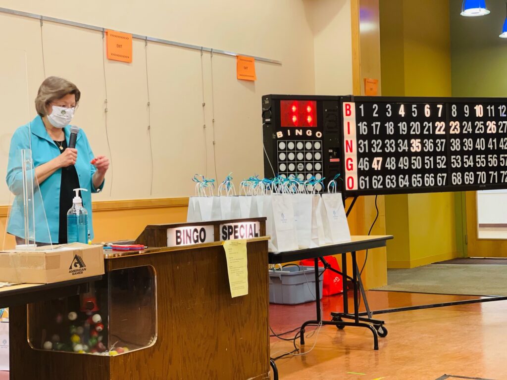 Kathy calling out bingo numbers